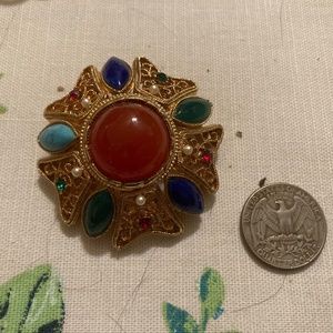 Large costume brooch
